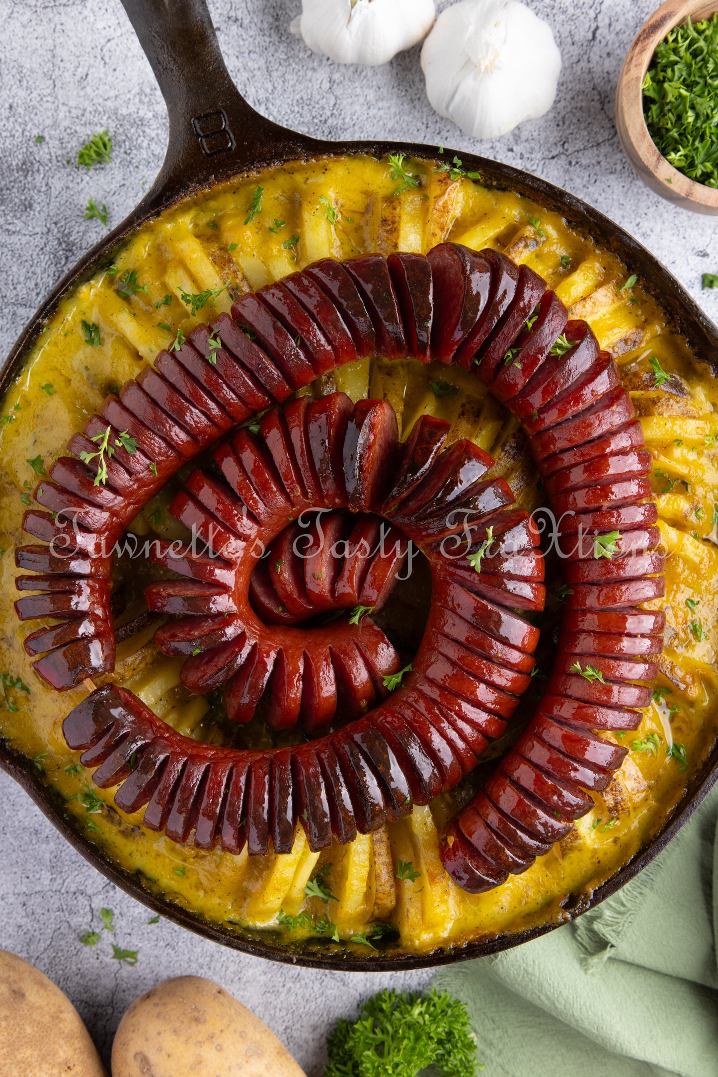 Cheesy Potatoes with Hasselback Smoked Sausage