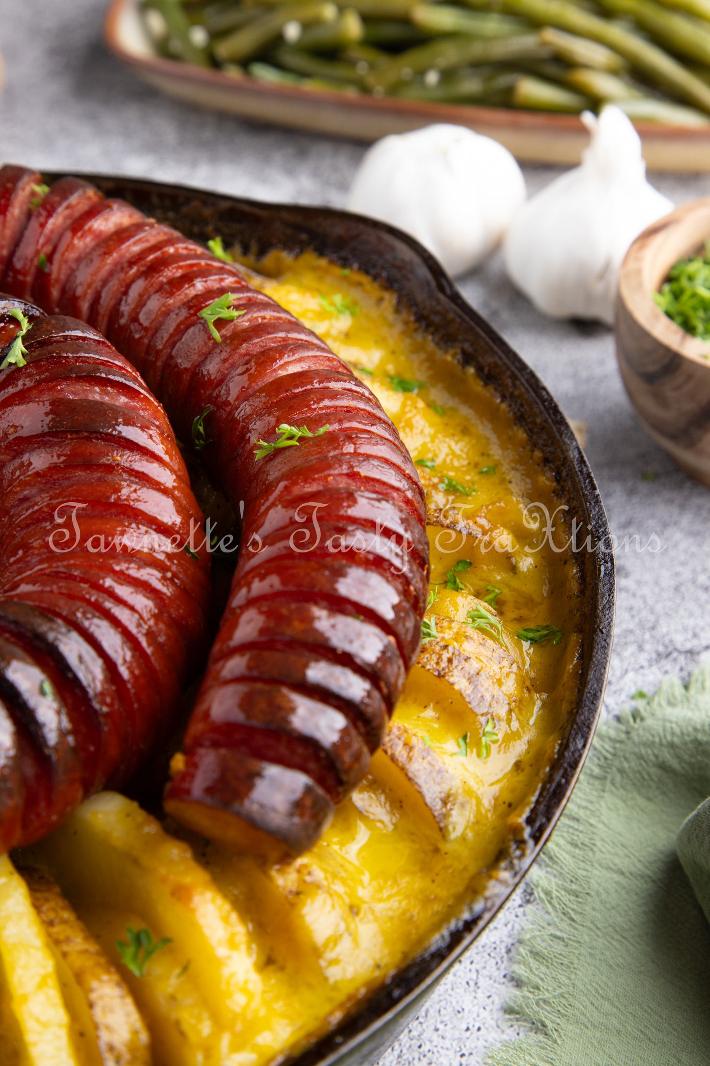 Cheesy Potatoes with Hasselback Smoked Sausage
