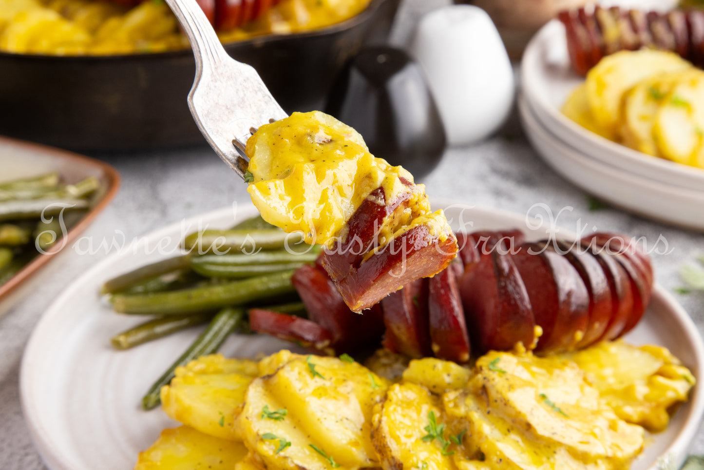 Cheesy Potatoes with Hasselback Smoked Sausage