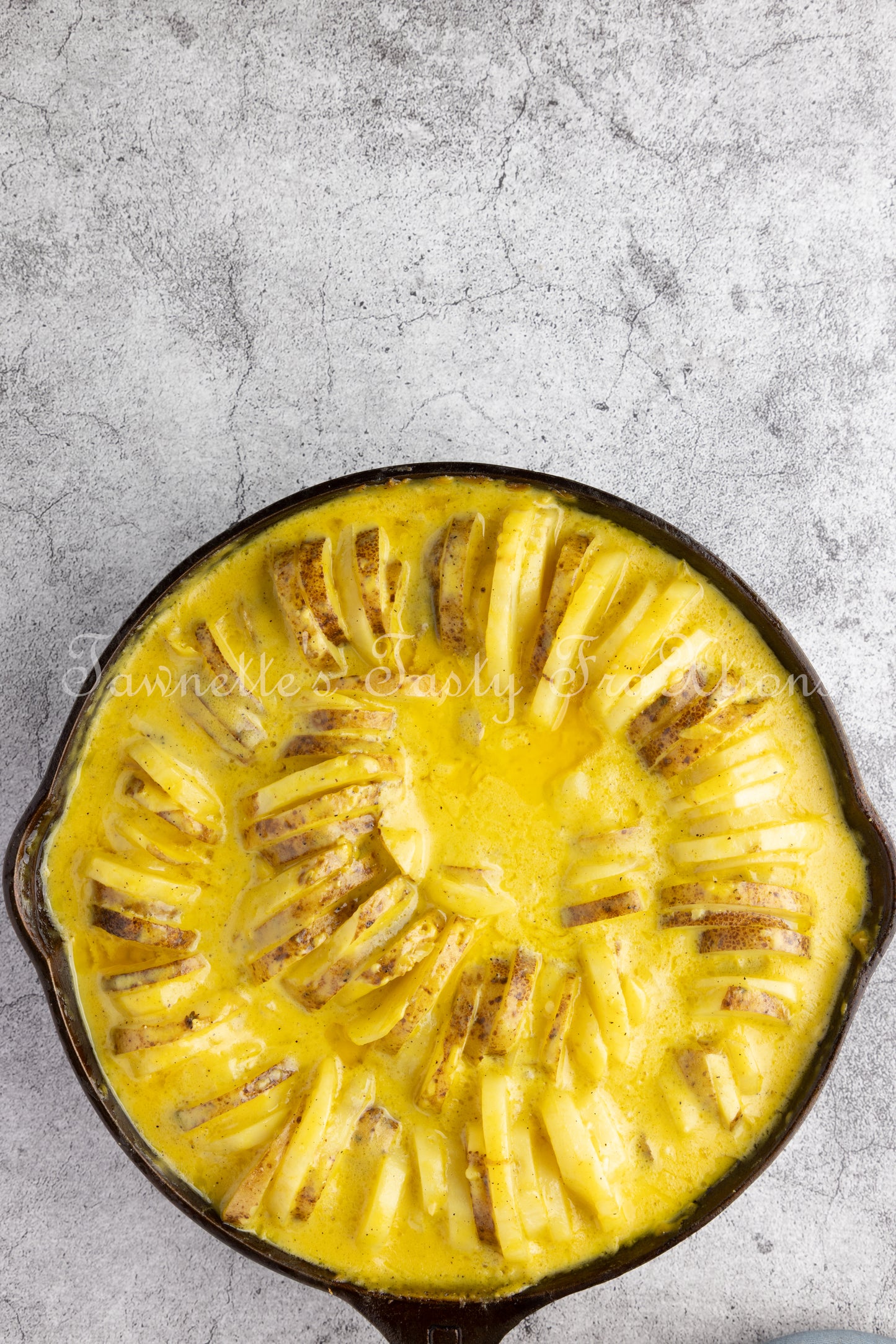 Cheesy Potatoes with Hasselback Smoked Sausage