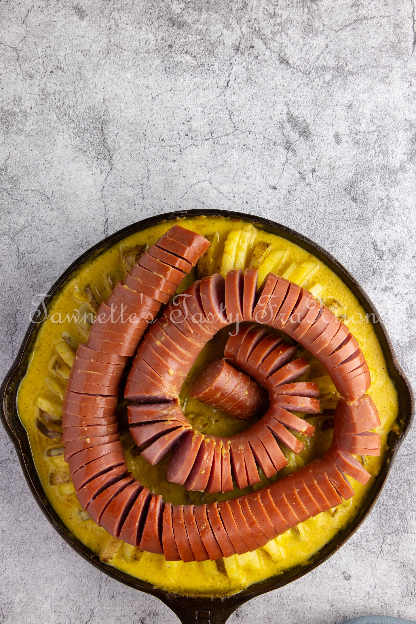 Cheesy Potatoes with Hasselback Smoked Sausage